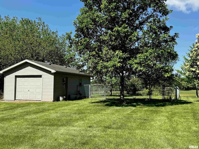 6 Marty Ln, Macomb, IL 61455 - view of yard featuring a detached garage and an outdoor structure