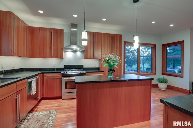 6 Marty Ln, Macomb, IL 61455 - kitchen with appliances with stainless steel finishes, wall chimney range hood, brown cabinetry, and recessed lighting