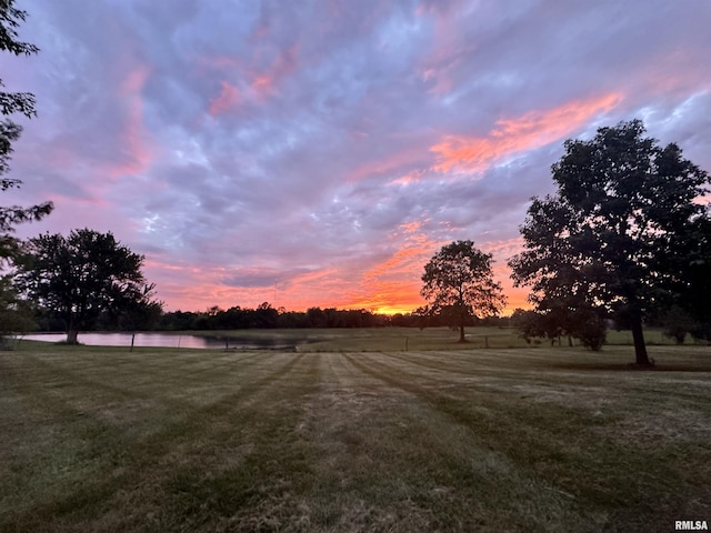6 Marty Ln, Macomb, IL 61455 - yard at dusk with a yard and a water view