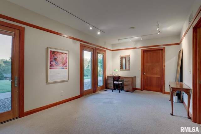 6 Marty Ln, Macomb, IL 61455 - foyer with french doors, light carpet, and rail lighting