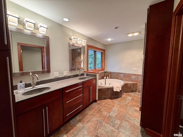 6 Marty Ln, Macomb, IL 61455 - bathroom with a bath, double vanity, and stone finish flooring