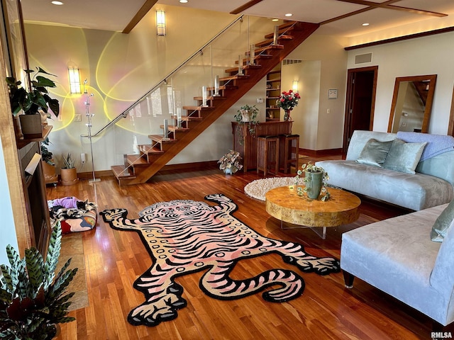 6 Marty Ln, Macomb, IL 61455 - living area with baseboards, stairs, wood-type flooring, and recessed lighting