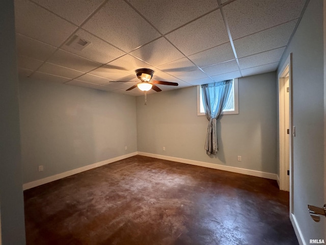 6 Marty Ln, Macomb, IL 61455 - spare room with concrete floors, ceiling fan, and a paneled ceiling