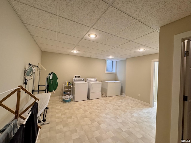 6 Marty Ln, Macomb, IL 61455 - basement featuring independent washer and dryer, a paneled ceiling, recessed lighting, refrigerator, and light flooring