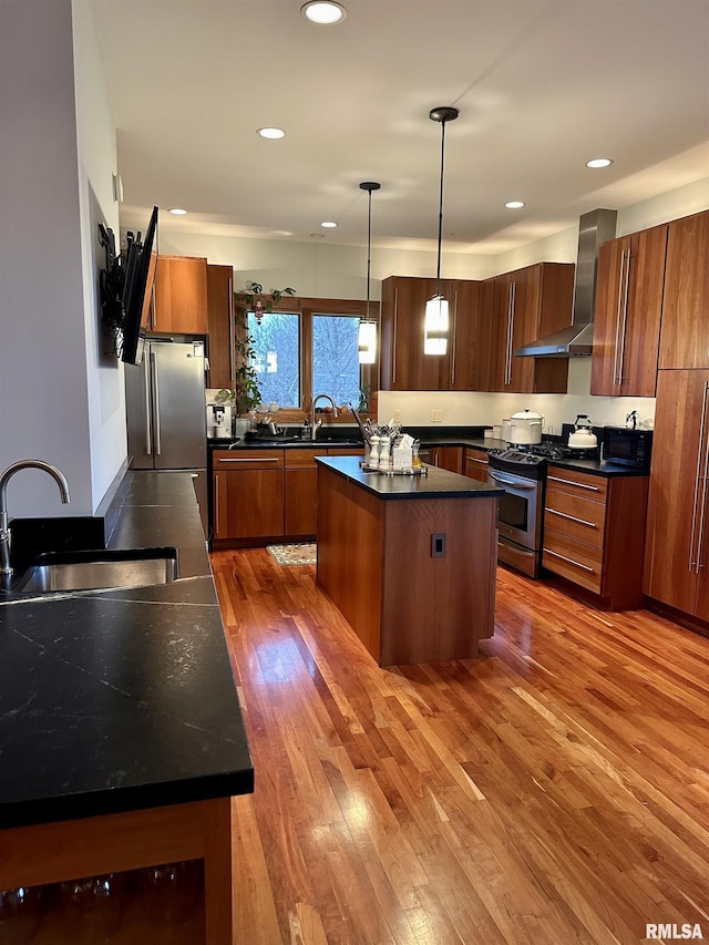 6 Marty Ln, Macomb, IL 61455 - kitchen with a sink, stainless steel appliances, dark countertops, wall chimney range hood, and a kitchen island