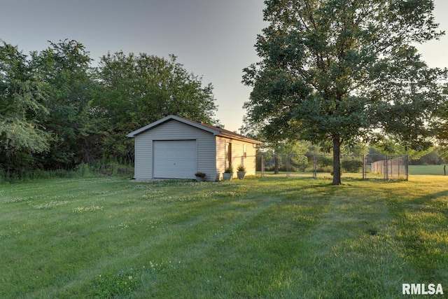 6 Marty Ln, Macomb, IL 61455 - view of yard with a garage and an outbuilding