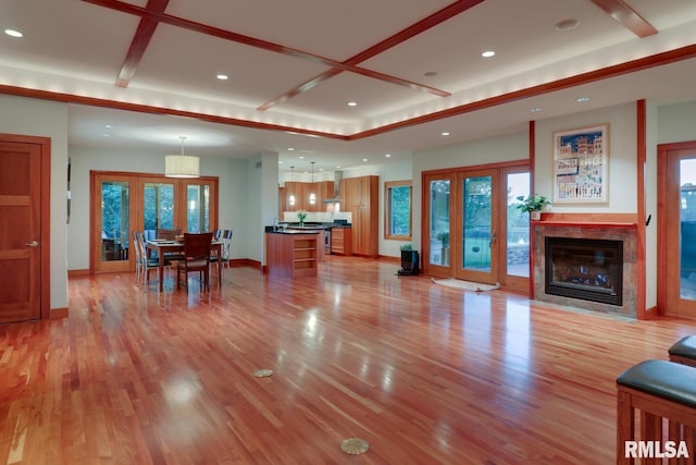 6 Marty Ln, Macomb, IL 61455 - living room with french doors, recessed lighting, light wood-type flooring, and a high end fireplace