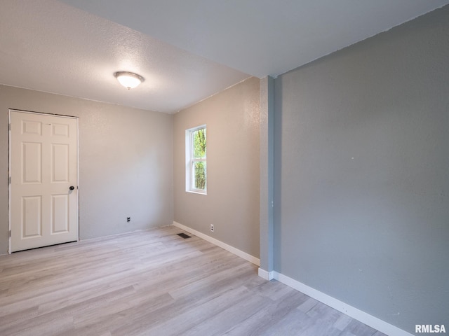 246 Herget St, Pekin, IL 61554 - unfurnished room featuring light wood-type flooring and baseboards