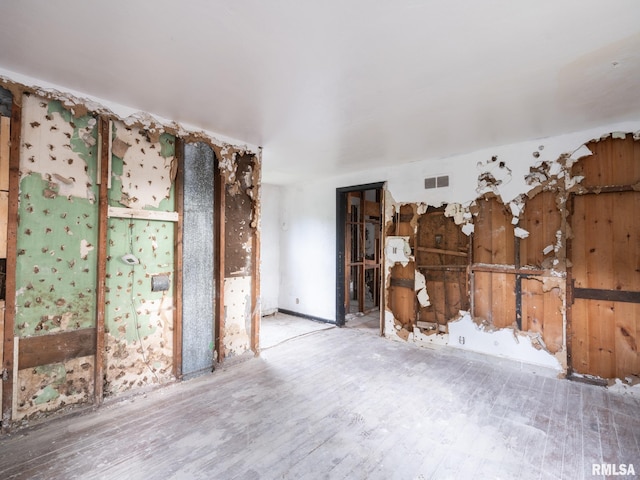 246 Herget St, Pekin, IL 61554 - empty room featuring wood finished floors