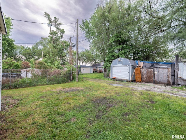 246 Herget St, Pekin, IL 61554 - view of yard with a shed and an outbuilding