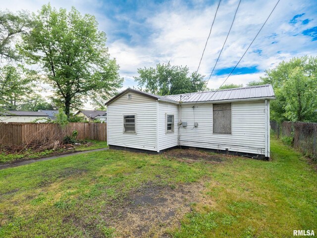 246 Herget St, Pekin, IL 61554 - rear view of property featuring metal roof