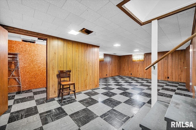 2309 W Manor Pkwy, West Peoria, IL 61604 - finished below grade area featuring tile patterned floors and wooden walls