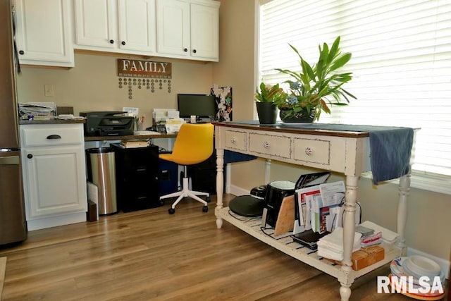 home office featuring light wood finished floors