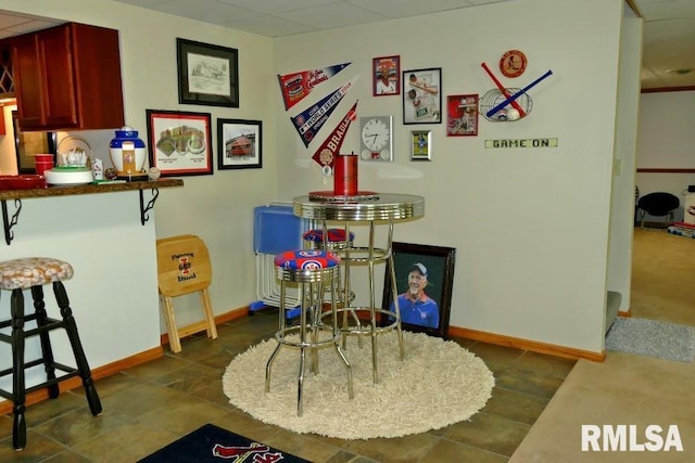 dining room with baseboards