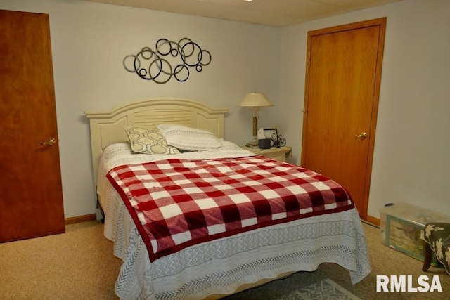 carpeted bedroom with baseboards