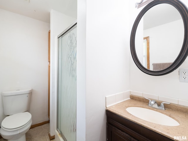 5816 N Cord Ct, Peoria Heights, IL 61616 - bathroom featuring a shower stall, toilet, vanity, and tile patterned flooring