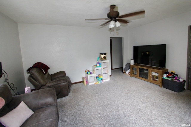 109 N 19th St, Pekin, IL 61554 - carpeted living area with a ceiling fan and baseboards