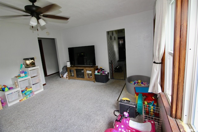 109 N 19th St, Pekin, IL 61554 - playroom with a ceiling fan and carpet floors