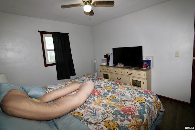 109 N 19th St, Pekin, IL 61554 - bedroom featuring wood finished floors, baseboards, and a ceiling fan