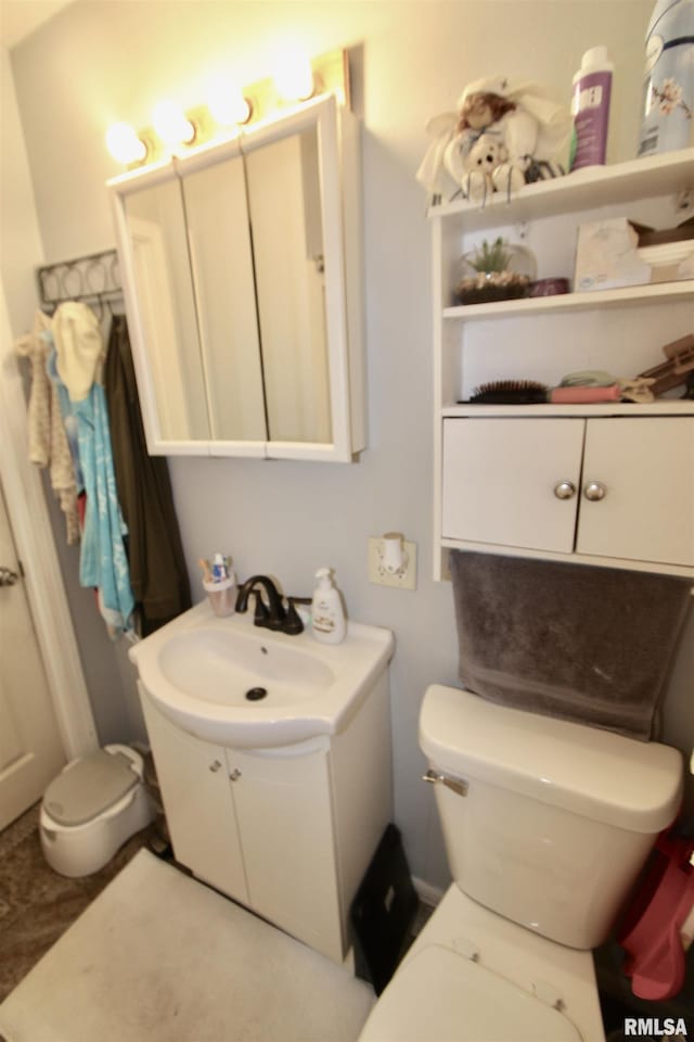 109 N 19th St, Pekin, IL 61554 - bathroom with toilet and vanity