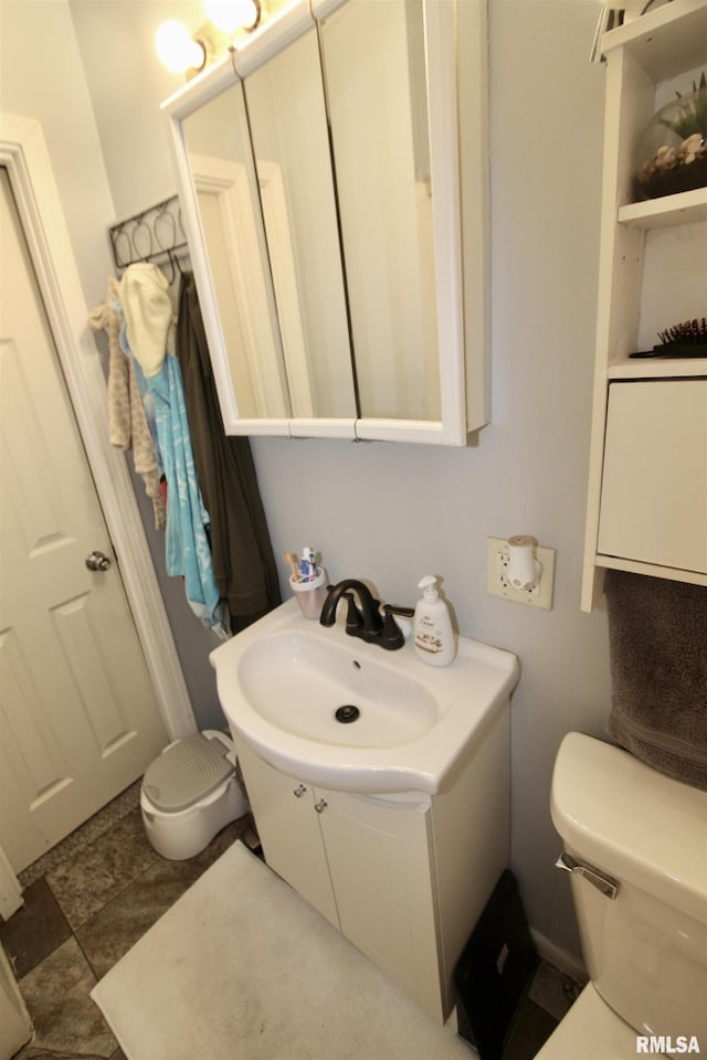 109 N 19th St, Pekin, IL 61554 - bathroom featuring toilet and vanity