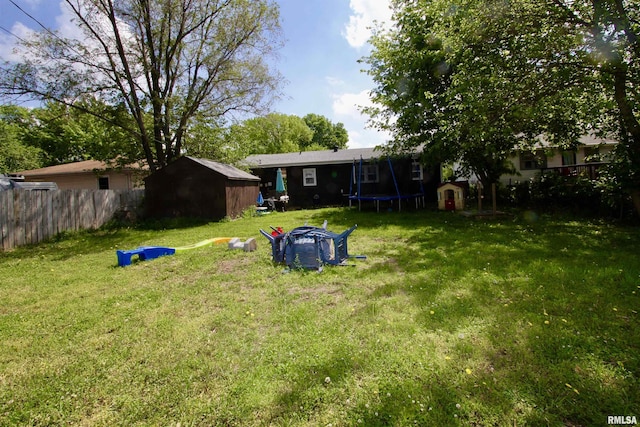 109 N 19th St, Pekin, IL 61554 - view of yard featuring a trampoline