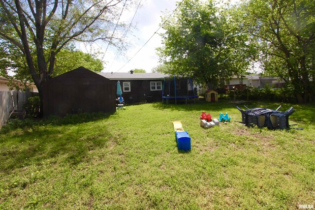 109 N 19th St, Pekin, IL 61554 - view of yard featuring a trampoline