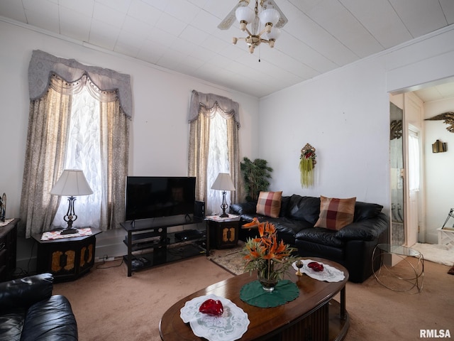 1218 N Sheridan Rd, Peoria, IL 61606 - carpeted living room with ornamental molding