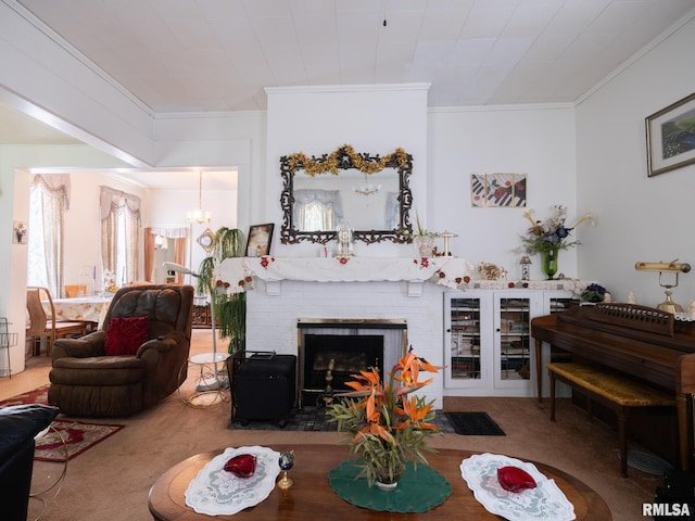 1218 N Sheridan Rd, Peoria, IL 61606 - living room with crown molding, a fireplace, and a chandelier