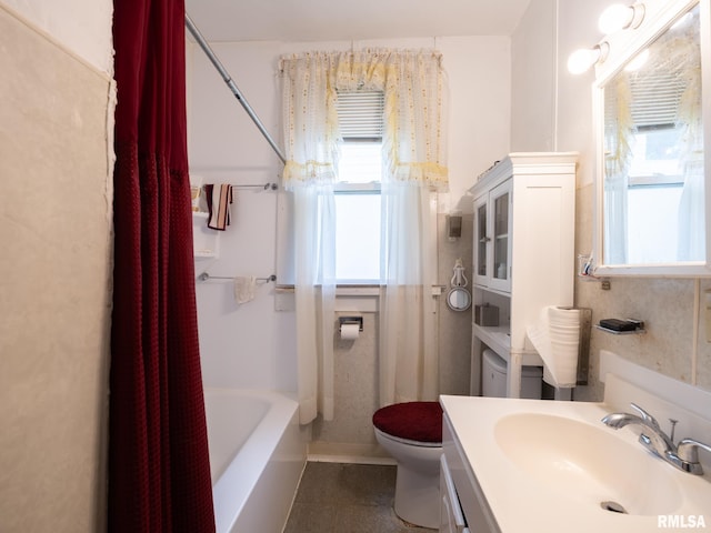 1218 N Sheridan Rd, Peoria, IL 61606 - bathroom featuring healthy amount of natural light, toilet, tile patterned floors, and vanity