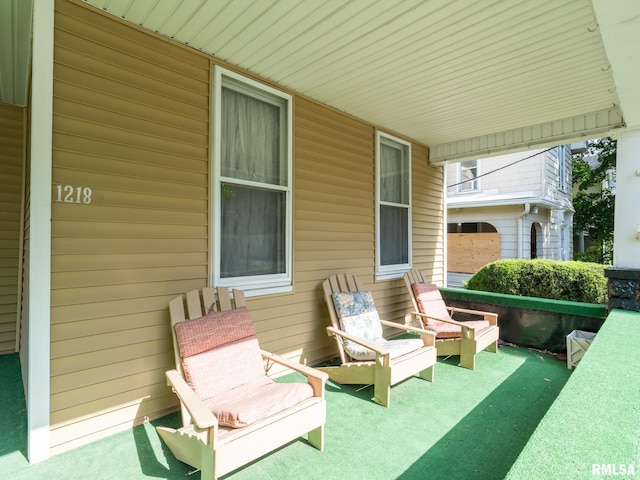 1218 N Sheridan Rd, Peoria, IL 61606 - view of patio / terrace featuring a porch