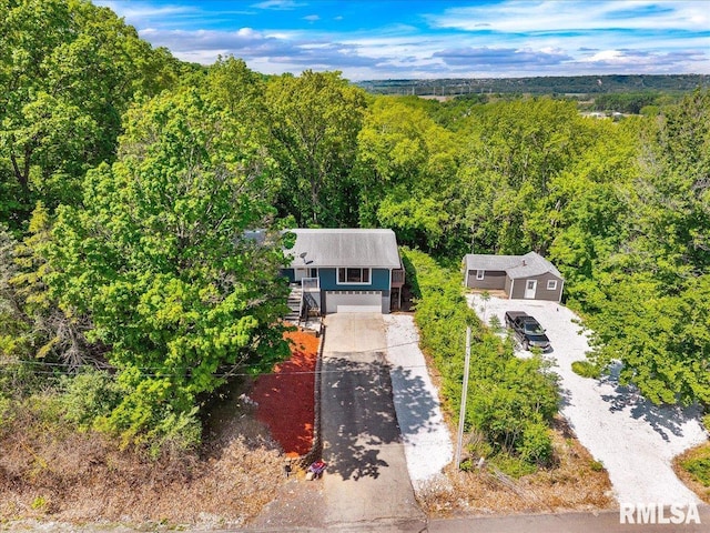 153 Spring Creek Ter, East Peoria, IL 61611 - view of subject property with a forest