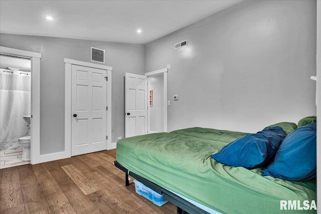153 Spring Creek Ter, East Peoria, IL 61611 - bedroom with wood finished floors, recessed lighting, and ensuite bath