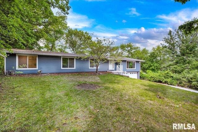 153 Spring Creek Ter, East Peoria, IL 61611 - ranch-style house featuring an attached garage and a front lawn