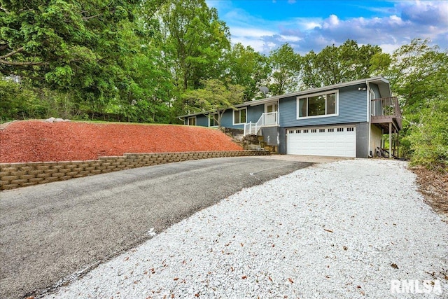 153 Spring Creek Ter, East Peoria, IL 61611 - ranch-style home featuring driveway, an attached garage, and a porch