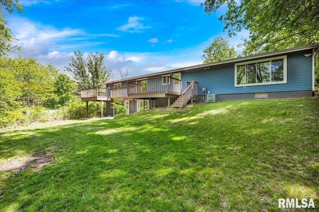 153 Spring Creek Ter, East Peoria, IL 61611 - back of property featuring a wooden deck, a yard, and stairway