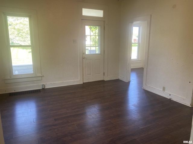 731 S Johnson St, Macomb, IL 61455 - foyer with dark wood finished floors and baseboards