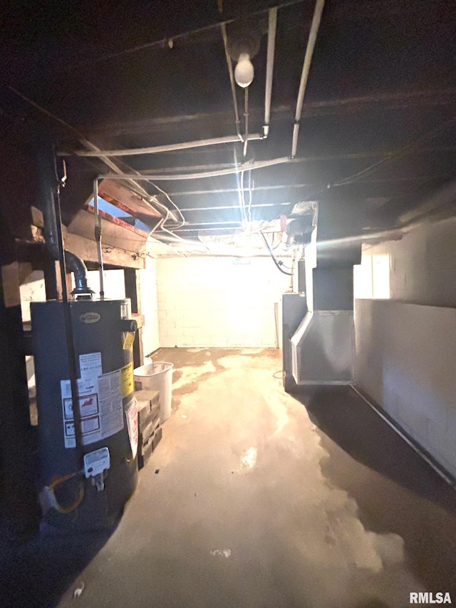 123 N Oak St, Williamsfield, IL 61489 - unfinished basement featuring water heater