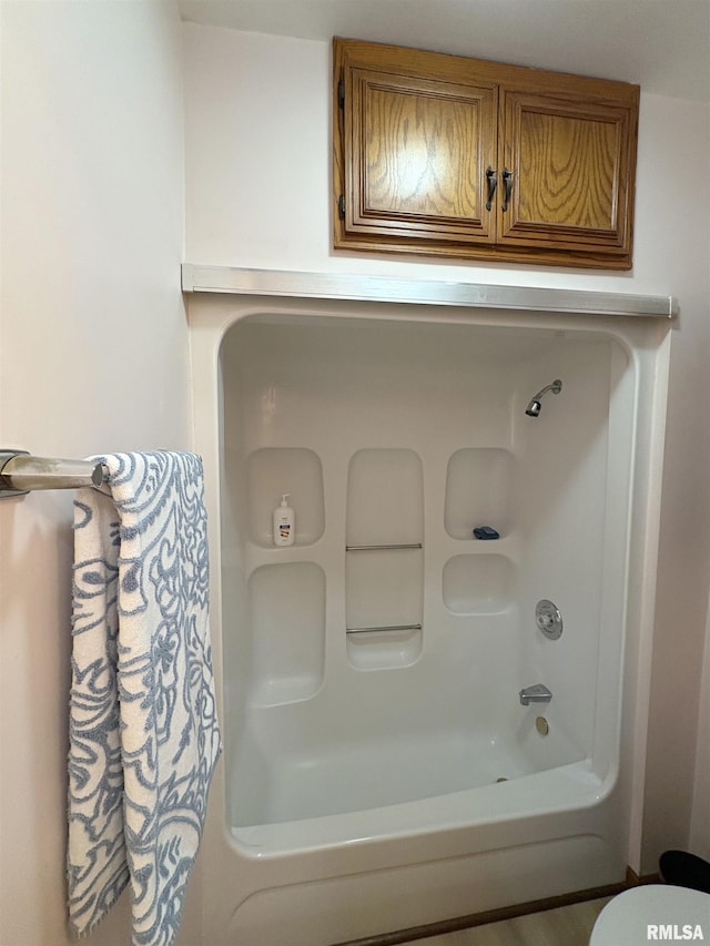 2704 N Dechman Ave, Peoria, IL 61603 - bathroom featuring  shower combination and toilet