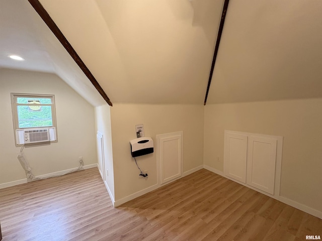 2704 N Dechman Ave, Peoria, IL 61603 - bonus room featuring vaulted ceiling, light wood-style floors, cooling unit, baseboards, and recessed lighting