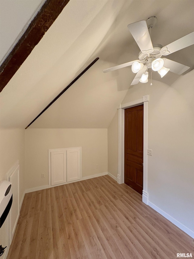 2704 N Dechman Ave, Peoria, IL 61603 - additional living space featuring a ceiling fan, light wood-style floors, vaulted ceiling, and baseboards