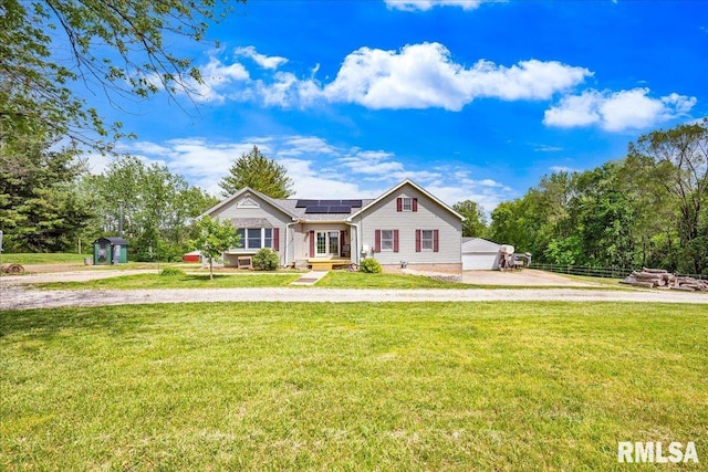 2918 S Hilton Ln, Peoria, IL 61607 - view of front facade with roof mounted solar panels and a front lawn