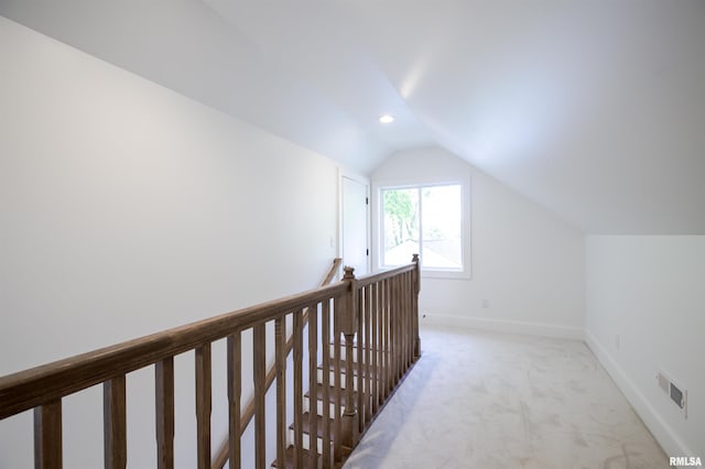 bonus room with vaulted ceiling, light colored carpet, baseboards, and recessed lighting