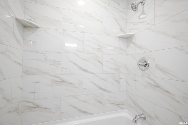 full bath featuring shower / tub combination