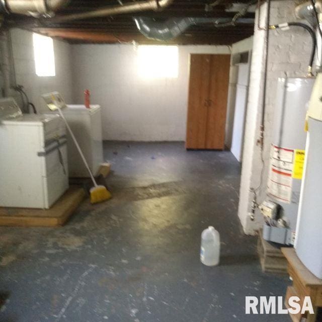 129 Pierson St, East Peoria, IL 61611 - basement featuring water heater and washer and dryer