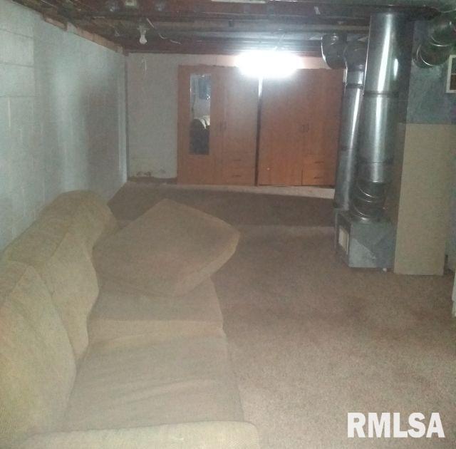 129 Pierson St, East Peoria, IL 61611 - unfinished below grade area featuring heating unit