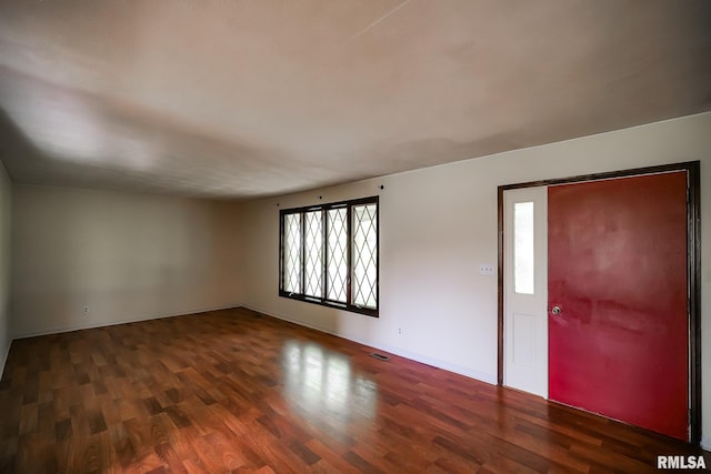 1529 W Richmar Rd, Peoria, IL 61615 - unfurnished room with wood finished floors and baseboards
