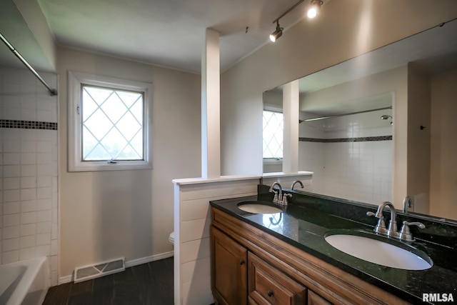 1529 W Richmar Rd, Peoria, IL 61615 - full bath featuring healthy amount of natural light, toilet, wood finished floors, and  shower combination