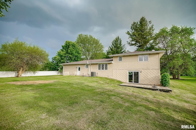 1529 W Richmar Rd, Peoria, IL 61615 - rear view of property featuring a wooden deck and central air condition unit