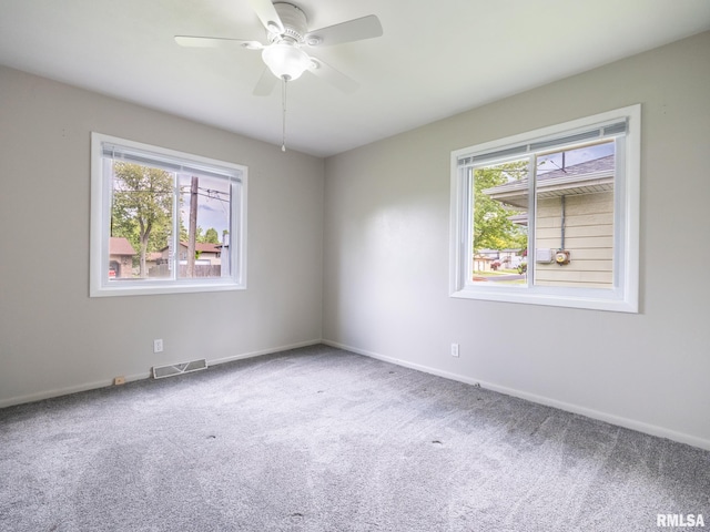 3509 S Dorothy Ct, Bartonville, IL 61607 - carpeted spare room with baseboards and ceiling fan